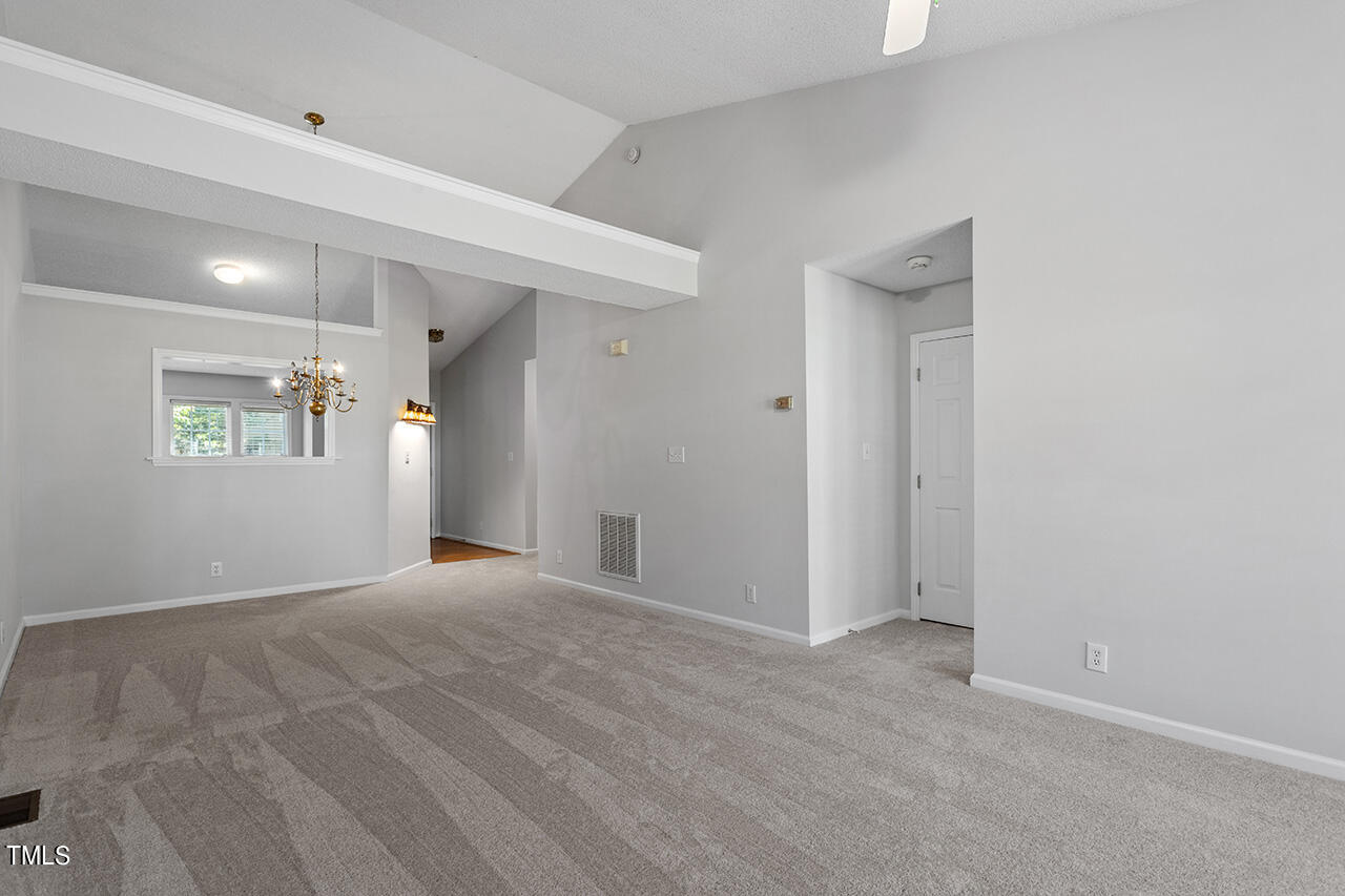 3907 Rim Court Raleigh, NC 27616 - Photo 21 of 30 a view of an empty room with a window