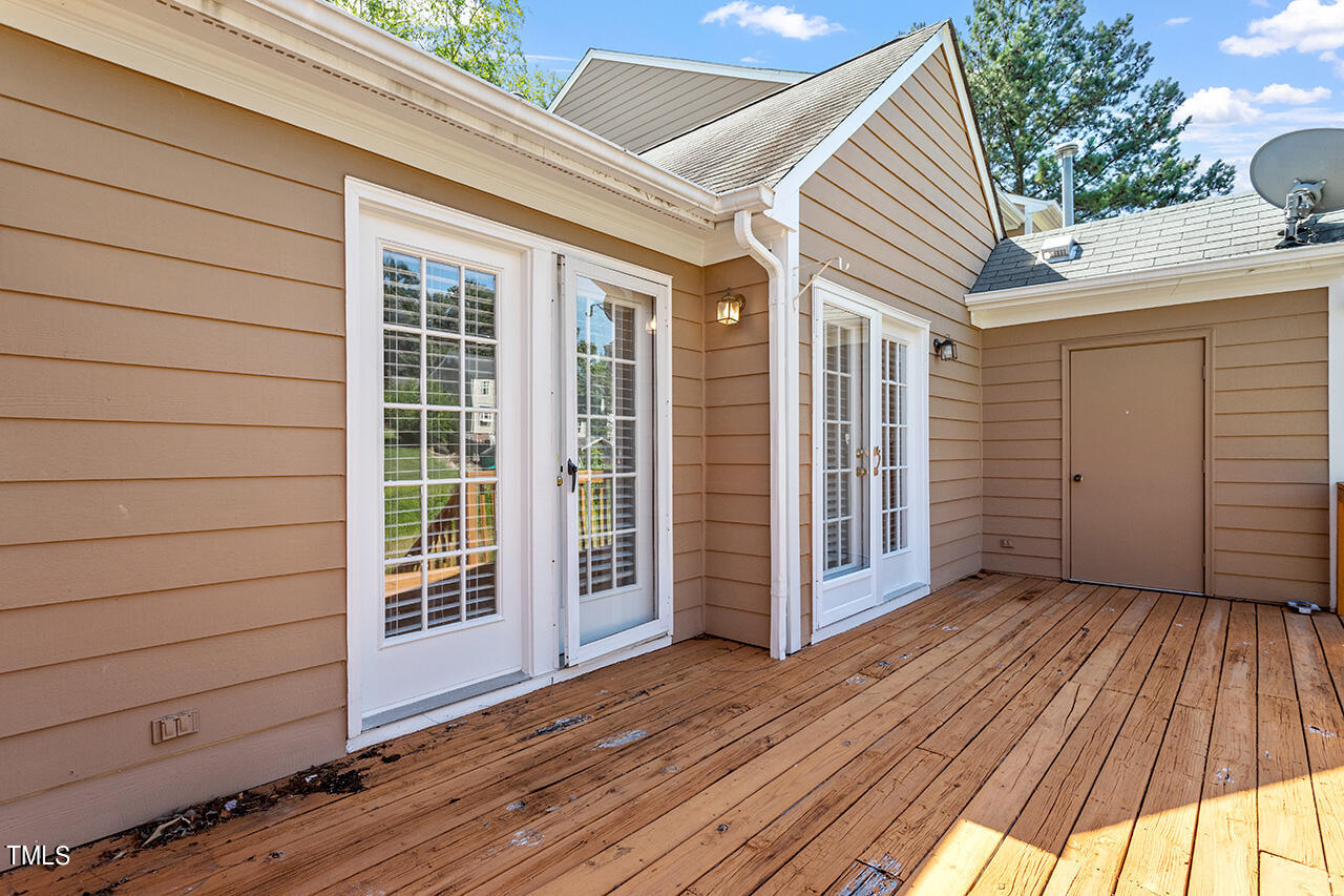 3907 Rim Court Raleigh, NC 27616 - Photo 8 of 30 an entrance view with wooden deck
