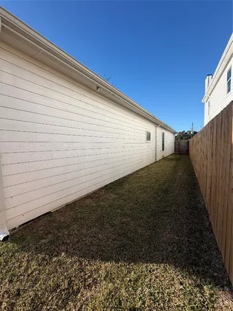 a view of a water with a yard