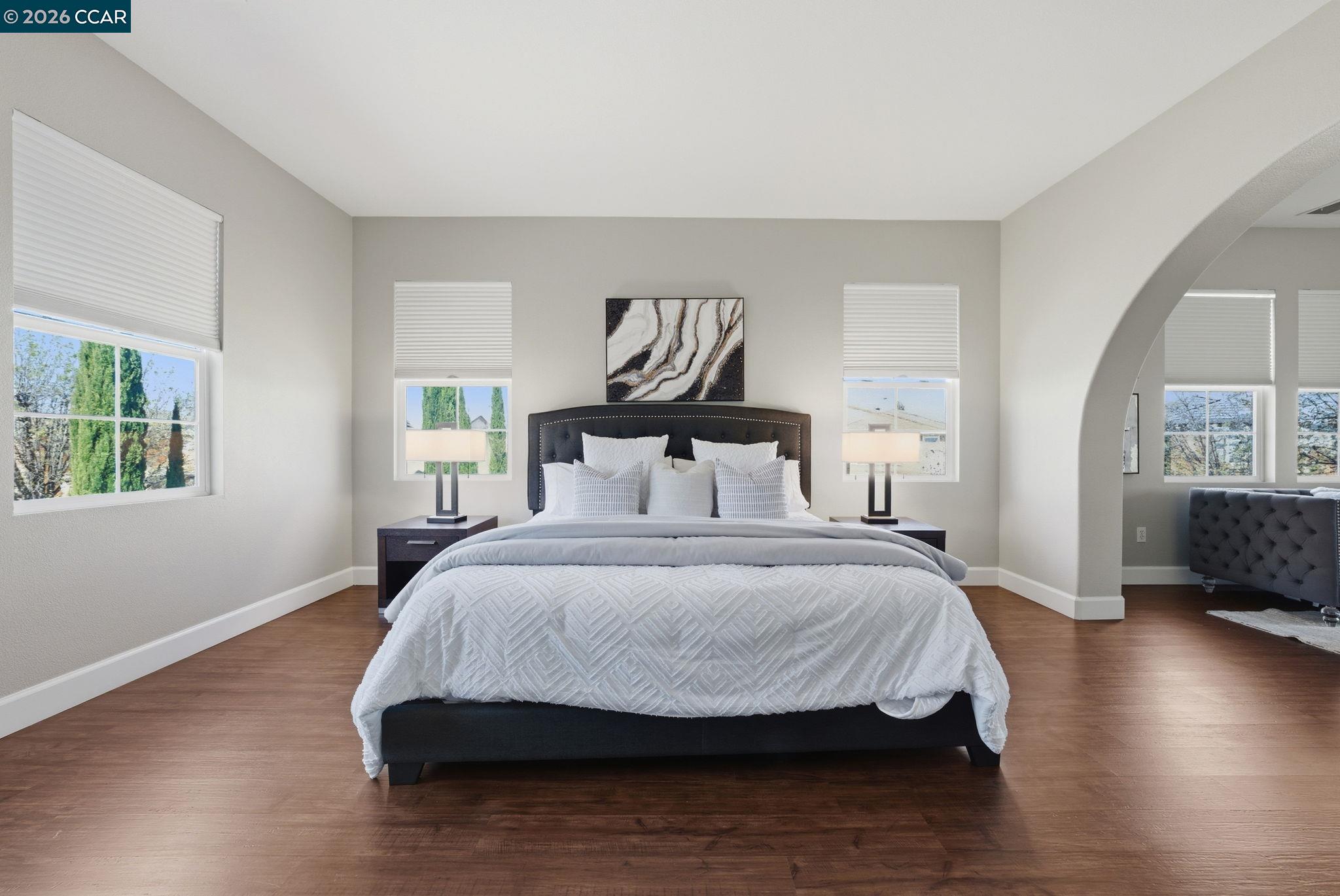 5324 Swainsons Court Concord, CA 94521 - Photo 25 of 59 a bedroom with a bed and wooden floor