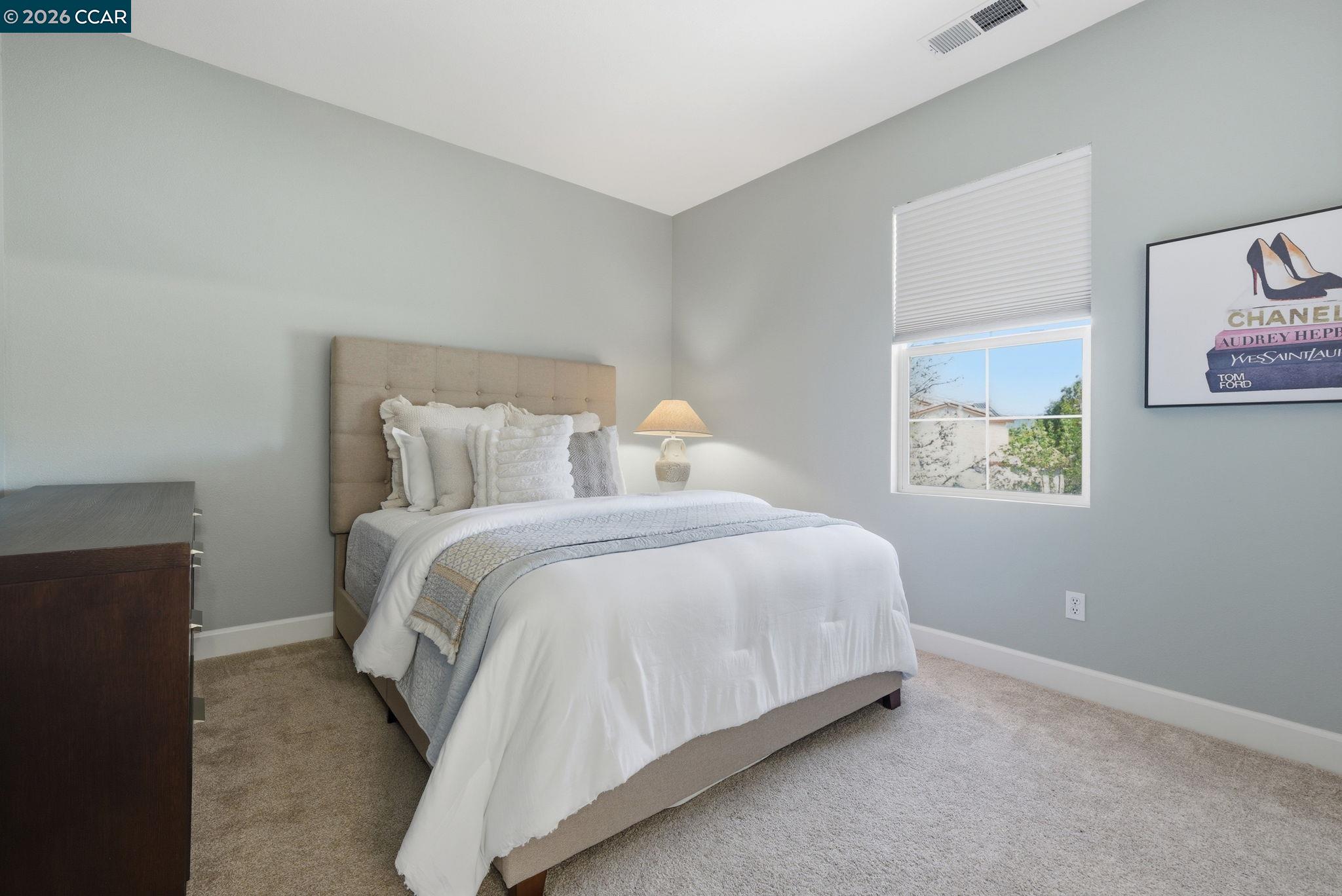 5324 Swainsons Court Concord, CA 94521 - Photo 39 of 59 a bedroom with a bed and wall painting