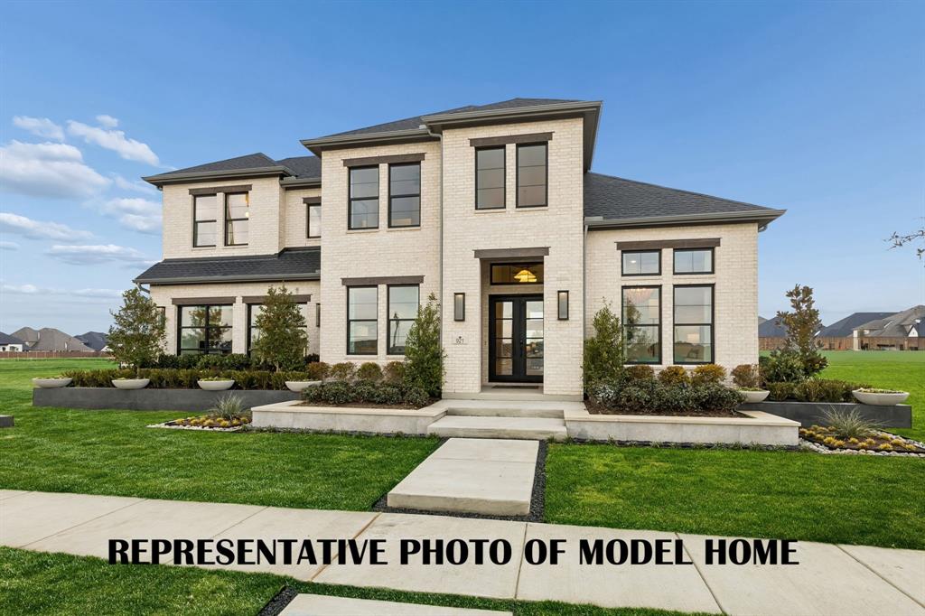 2460 Harpole Road Prosper, TX 75078 - Photo 6 of 9 Visit our fantastic new model home to see all the new and exciting floor plans being offered and reserve your dream home today! REPRESENTATIVE PHOTO OF MODEL HOME