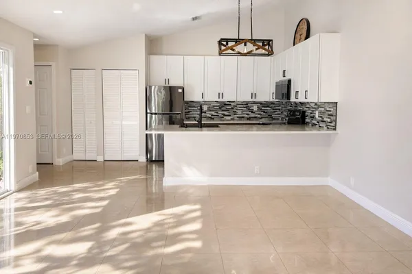 a view of a kitchen with a stove