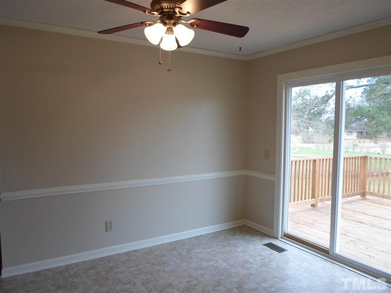 10913 Poole Road Wendell, NC 27591 - Photo 4 of 22 Nice dining area with chairrail and overlooks backyard.