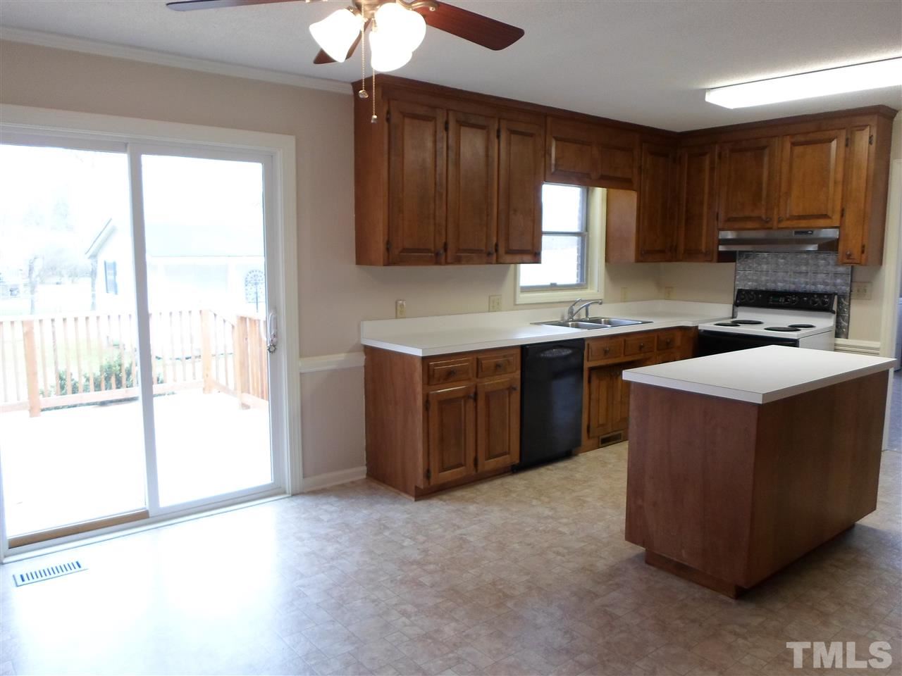 10913 Poole Road Wendell, NC 27591 - Photo 5 of 22 Great kitchen area with center island and lots of cabinets.