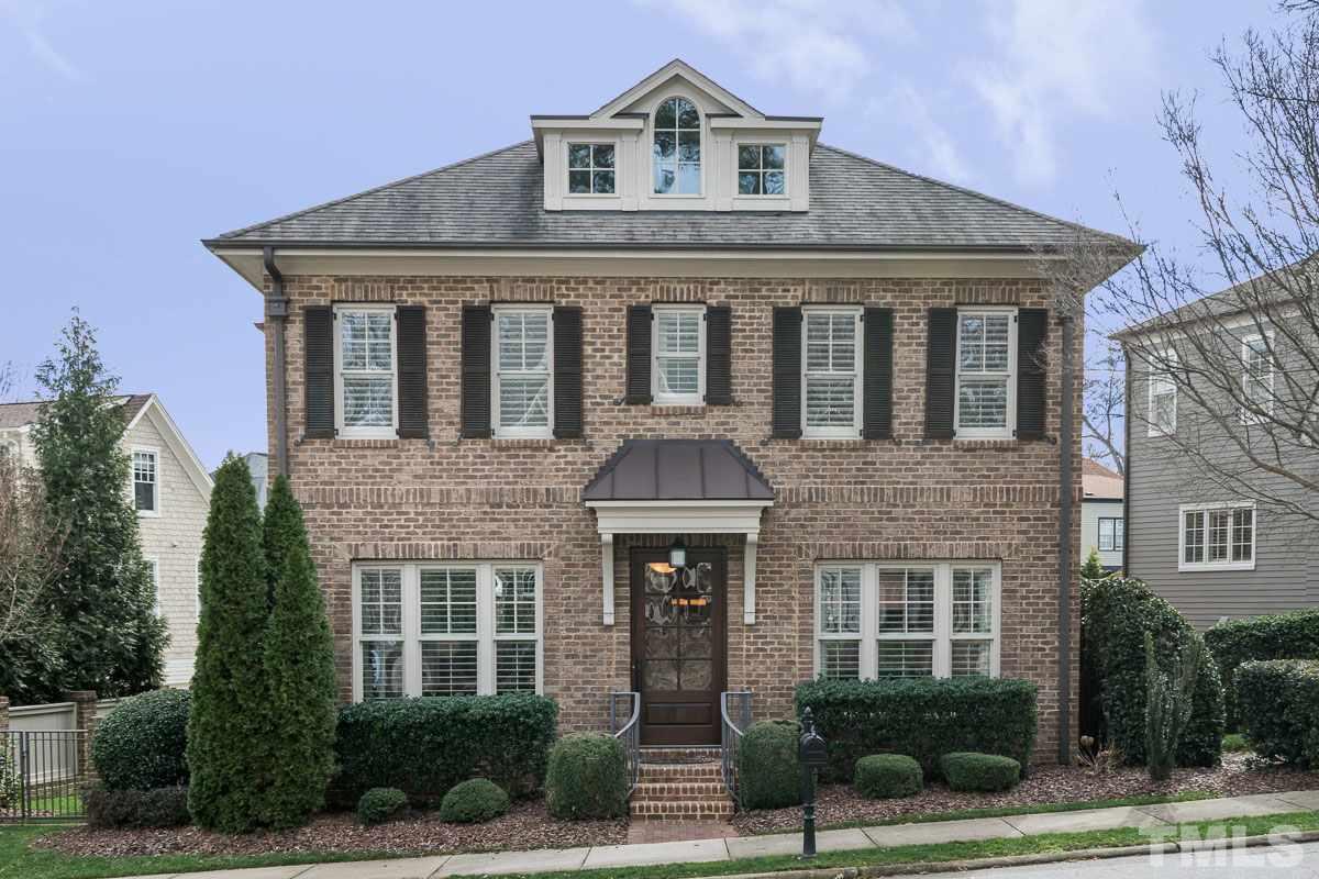 540 Guilford Circle Raleigh, NC 27608 - Photo 1 of 25 a front view of a house with garden