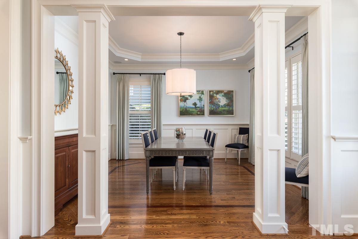 540 Guilford Circle Raleigh, NC 27608 - Photo 3 of 25 a view of a dining room with furniture window and wooden floor