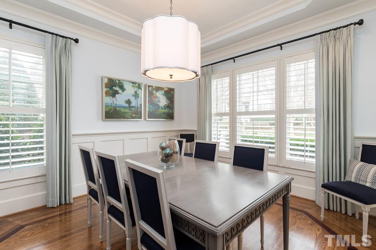 540 Guilford Circle Raleigh, NC 27608 - Photo 4 of 25 a view of a dining room with furniture window and wooden floor