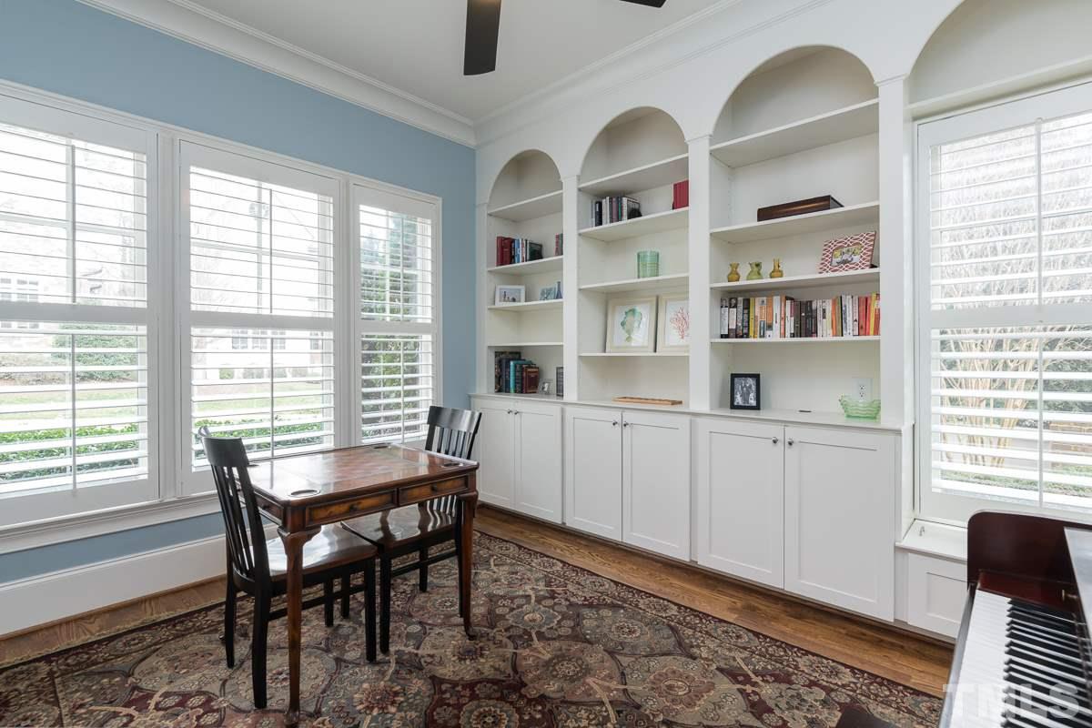 540 Guilford Circle Raleigh, NC 27608 - Photo 5 of 25 a dining room with furniture and window
