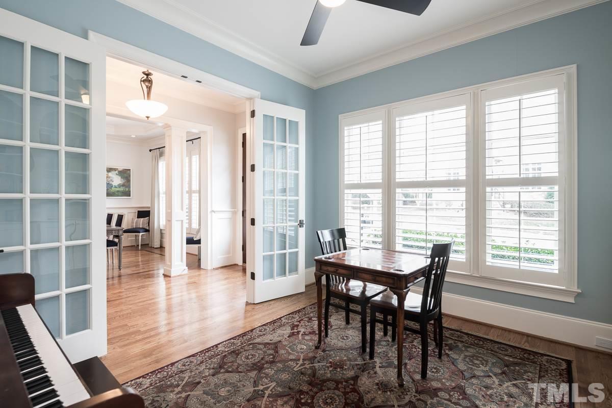 540 Guilford Circle Raleigh, NC 27608 - Photo 6 of 25 a view of a dining room with furniture and wooden floor