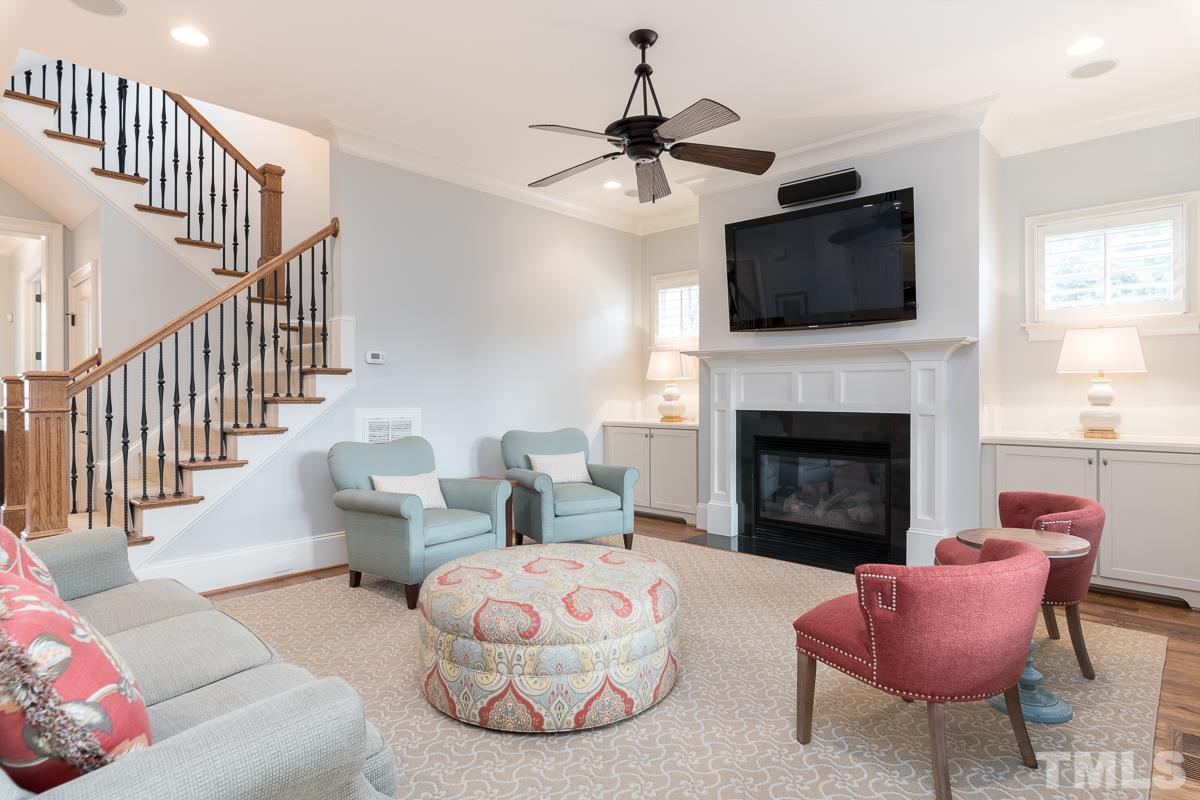 540 Guilford Circle Raleigh, NC 27608 - Photo 7 of 25 a living room with furniture fireplace and flat screen tv