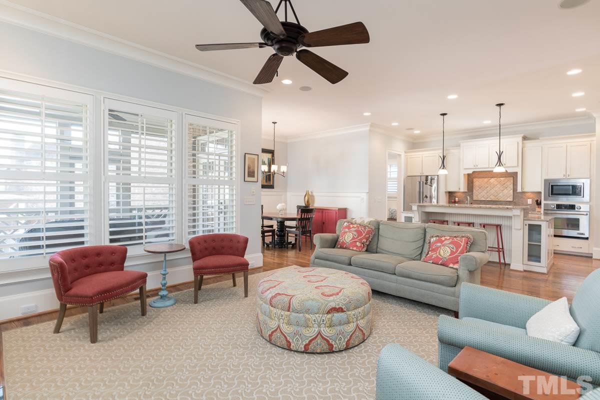 540 Guilford Circle Raleigh, NC 27608 - Photo 8 of 25 a living room with furniture and a large window