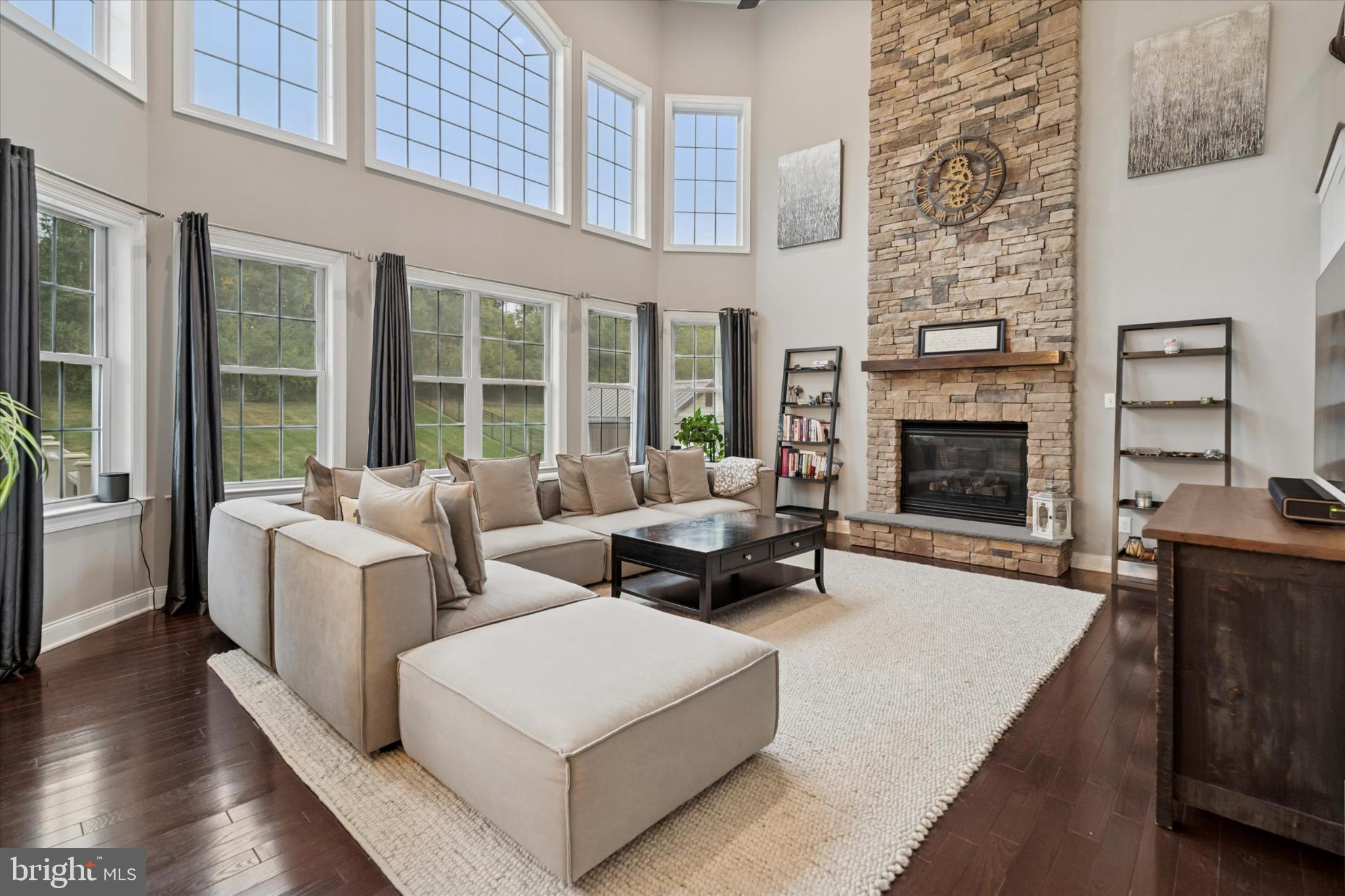 124 Bennington Road Phoenixville, PA 19460 - Photo 16 of 54 a living room with furniture and a fireplace