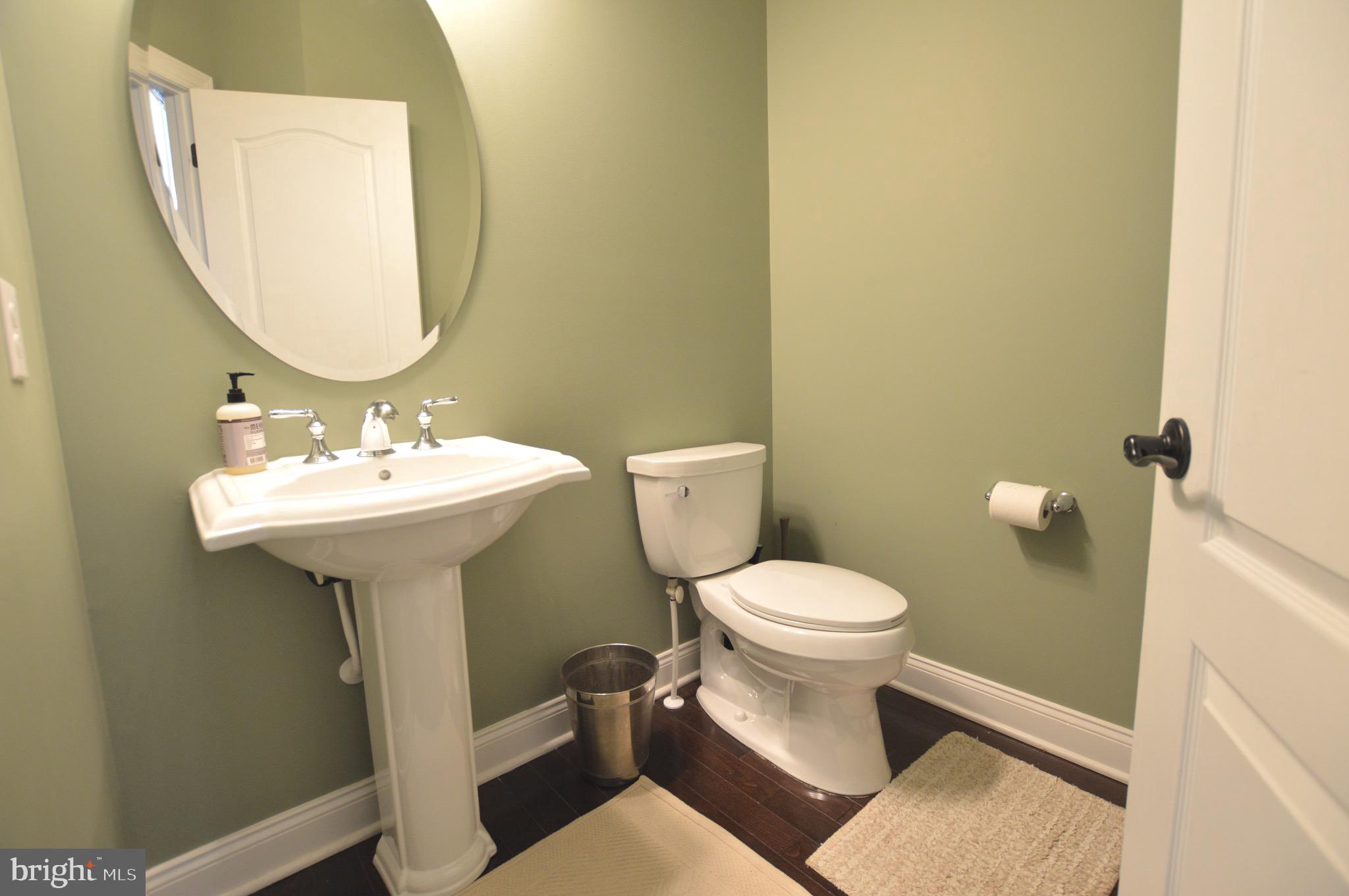 124 Bennington Road Phoenixville, PA 19460 - Photo 21 of 54 a white toilet sitting next to a bathroom sink