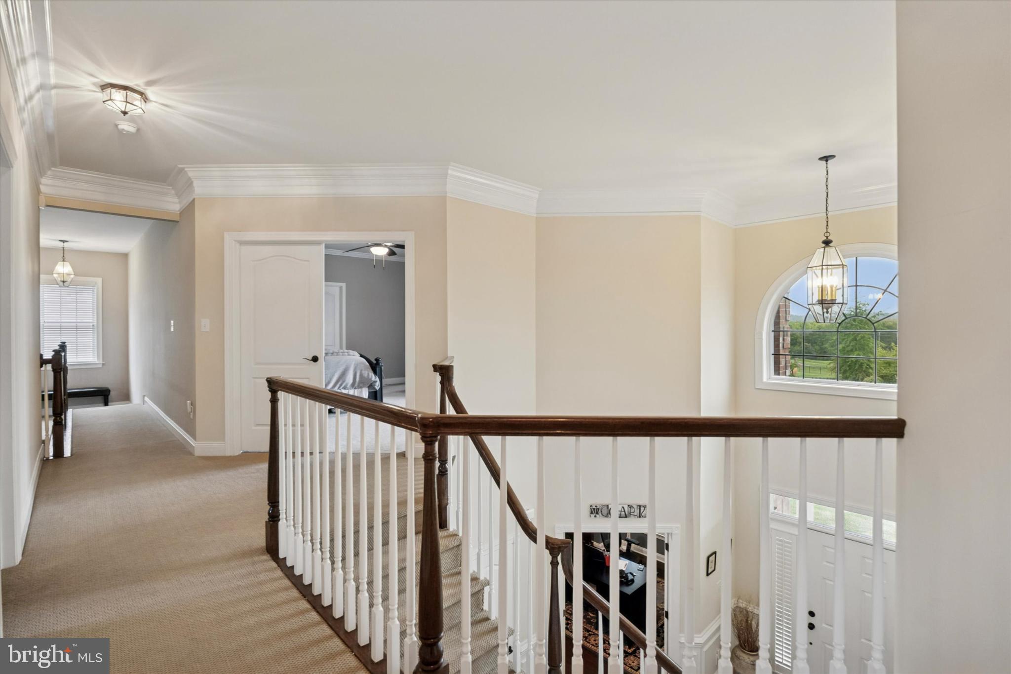 124 Bennington Road Phoenixville, PA 19460 - Photo 22 of 54 a view of a hallway with a window and stairs