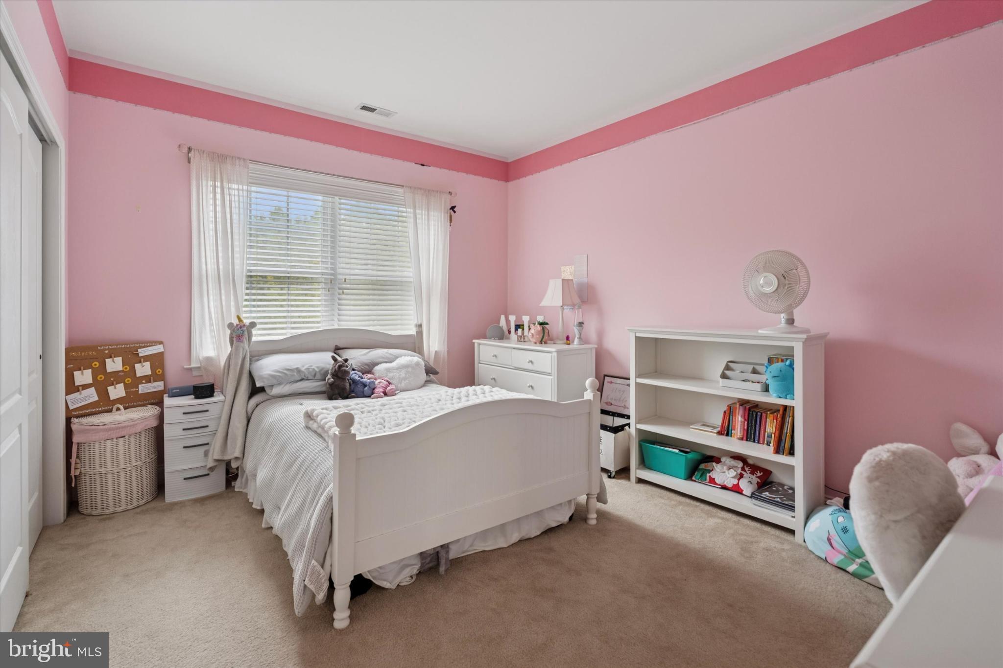 124 Bennington Road Phoenixville, PA 19460 - Photo 33 of 54 a bedroom with a bed and a painting on the wall