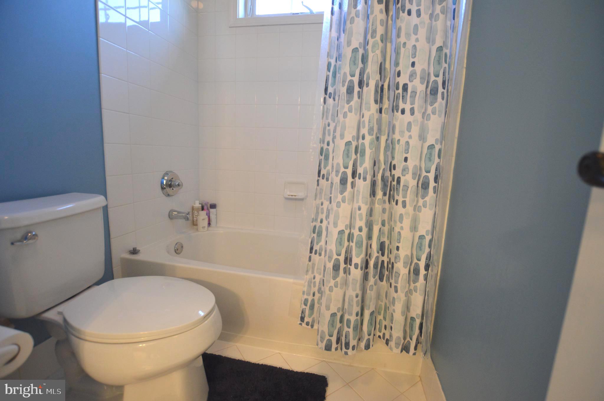 124 Bennington Road Phoenixville, PA 19460 - Photo 35 of 54 a bathroom with a toilet and shower