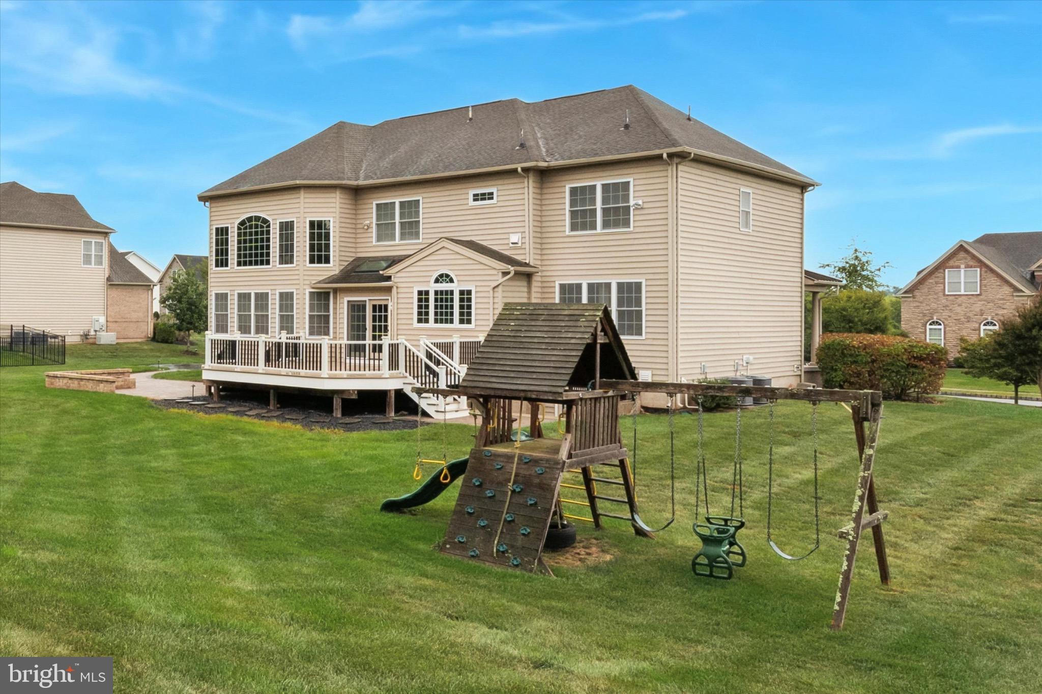 124 Bennington Road Phoenixville, PA 19460 - Photo 5 of 54 a front view of a house with a yard table and chairs