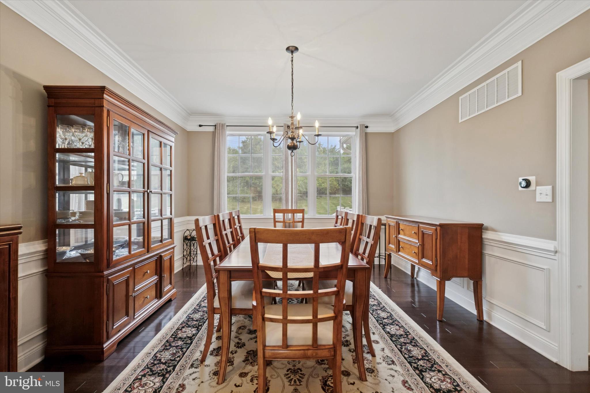 124 Bennington Road Phoenixville, PA 19460 - Photo 9 of 54 a view of a dining room with furniture window and wooden floor