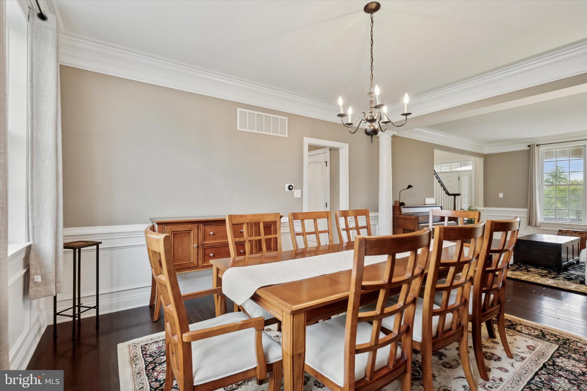 124 Bennington Road Phoenixville, PA 19460 - Photo 10 of 54 a view of a dining room with furniture and a chandelier