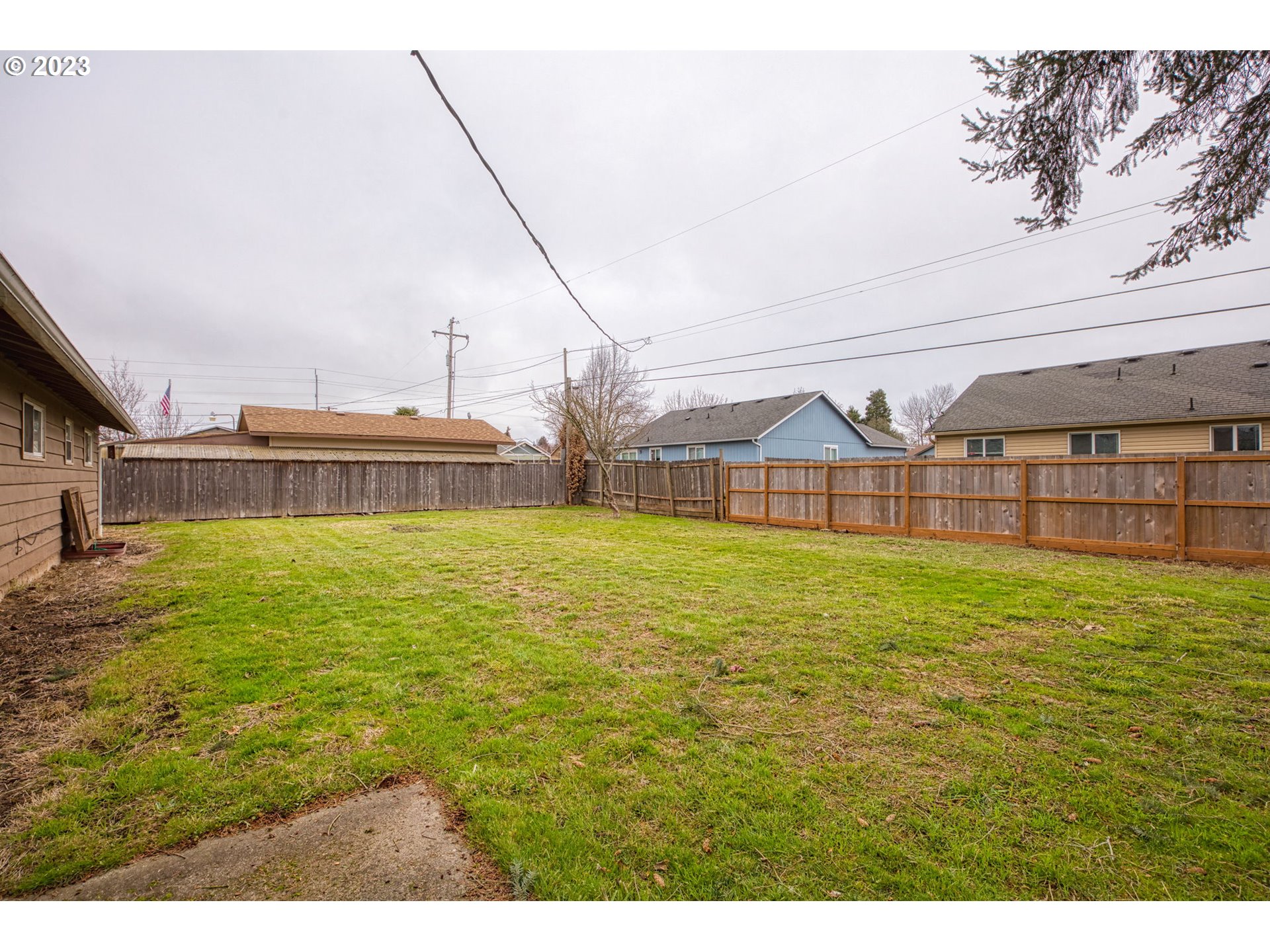 823 South 38th Street Springfield, OR 97478 - Photo 23 of 26 a view of a house with a yard
