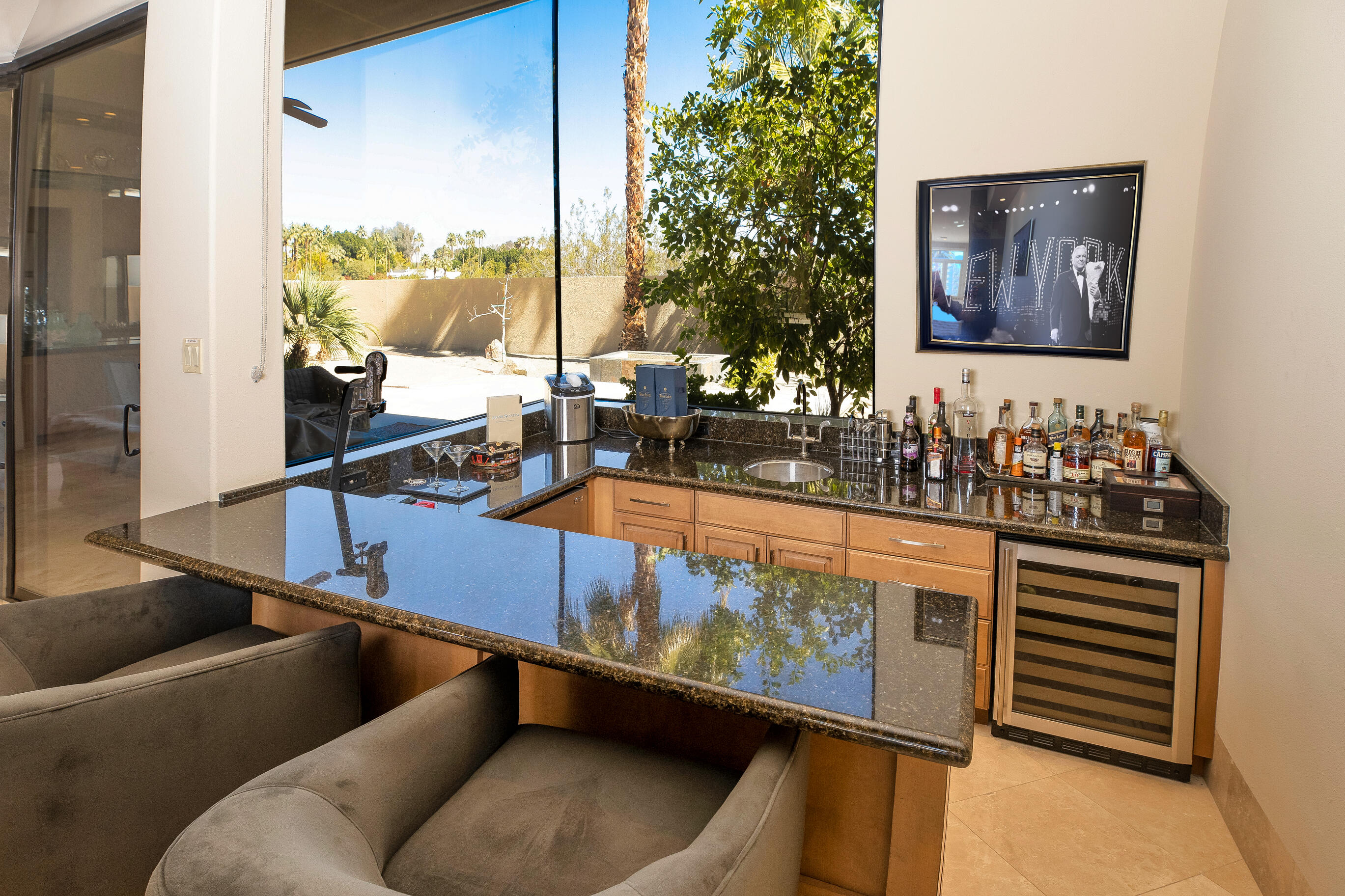 29 Sun Ridge Circle Rancho Mirage, CA 92270 - Photo 16 of 57 a view of a living room and kitchen