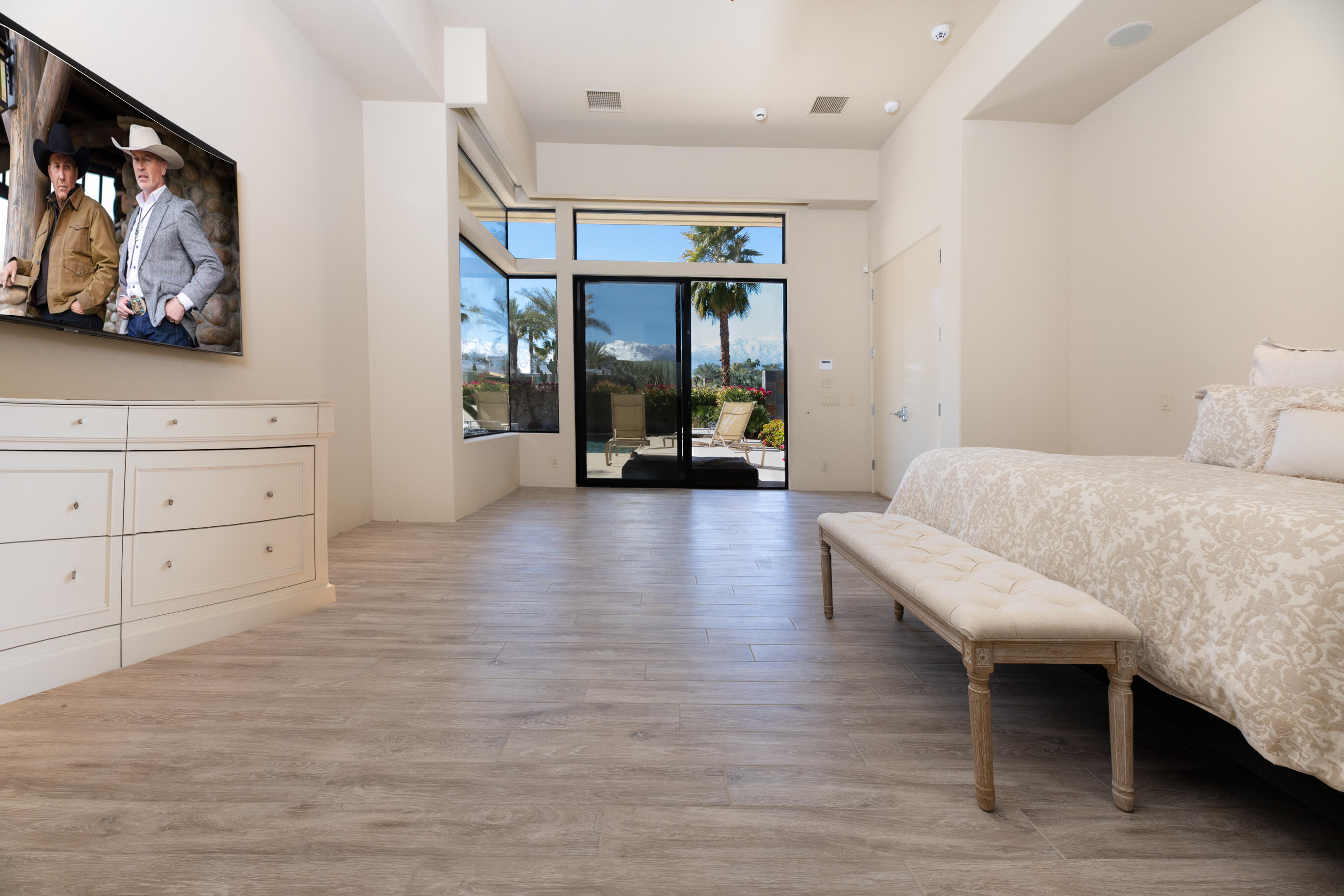 29 Sun Ridge Circle Rancho Mirage, CA 92270 - Photo 26 of 57 a living room with furniture and wooden floor