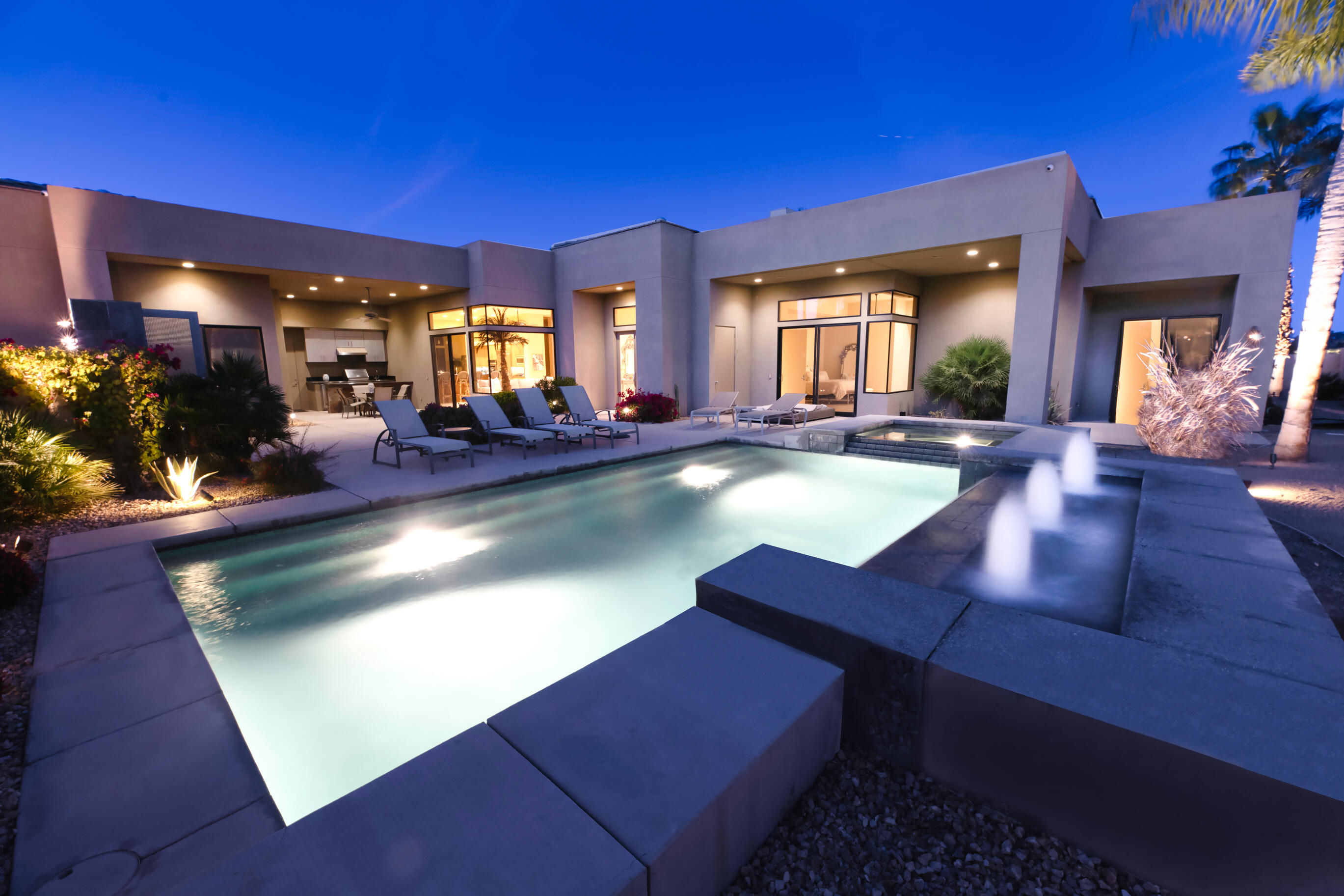 29 Sun Ridge Circle Rancho Mirage, CA 92270 - Photo 3 of 57 a view of a house with swimming pool