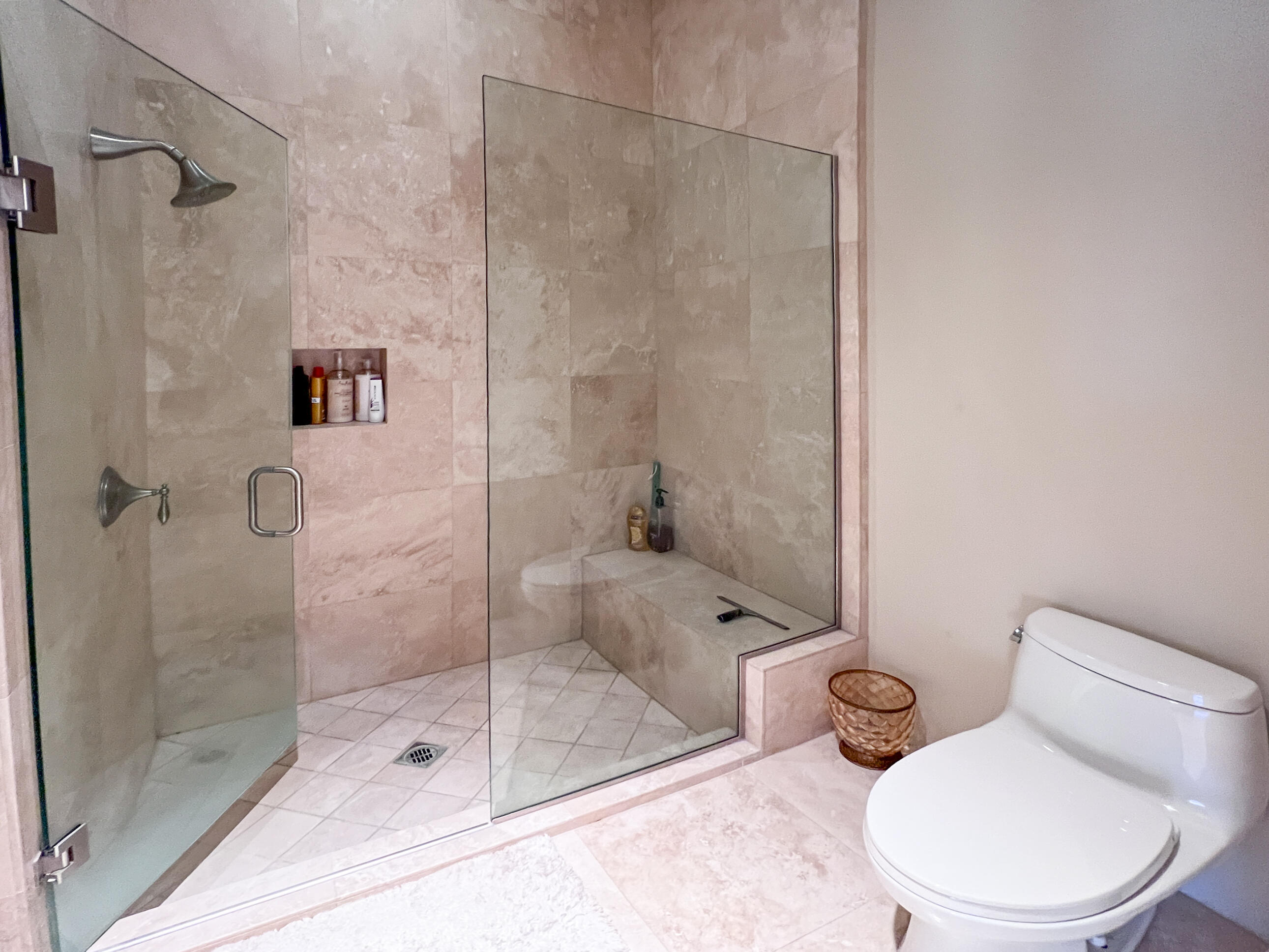 29 Sun Ridge Circle Rancho Mirage, CA 92270 - Photo 39 of 57 a white toilet next to a bathroom