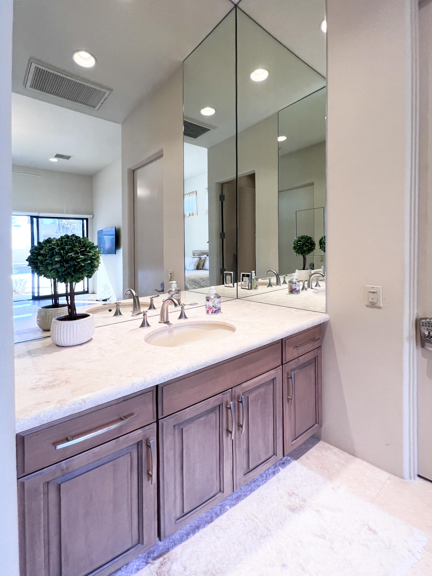 29 Sun Ridge Circle Rancho Mirage, CA 92270 - Photo 40 of 57 a bathroom with a sink double vanity and a mirror