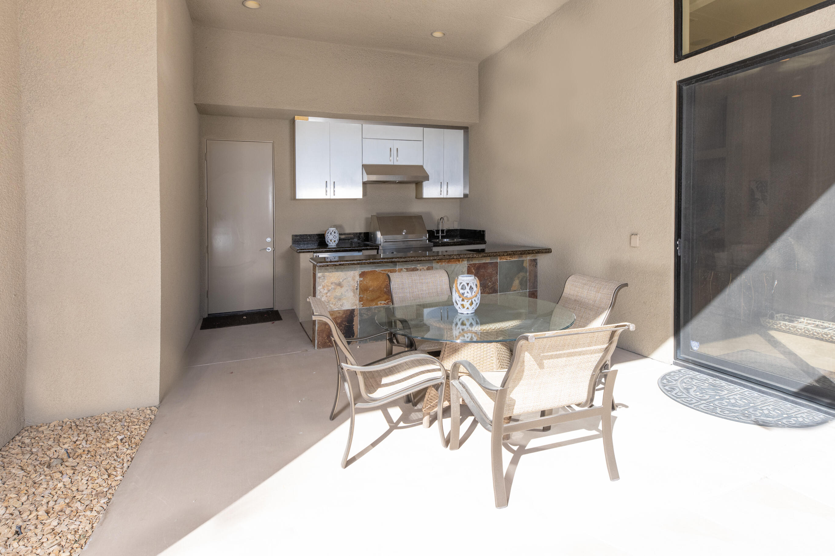 29 Sun Ridge Circle Rancho Mirage, CA 92270 - Photo 42 of 57 a room with a table and chairs