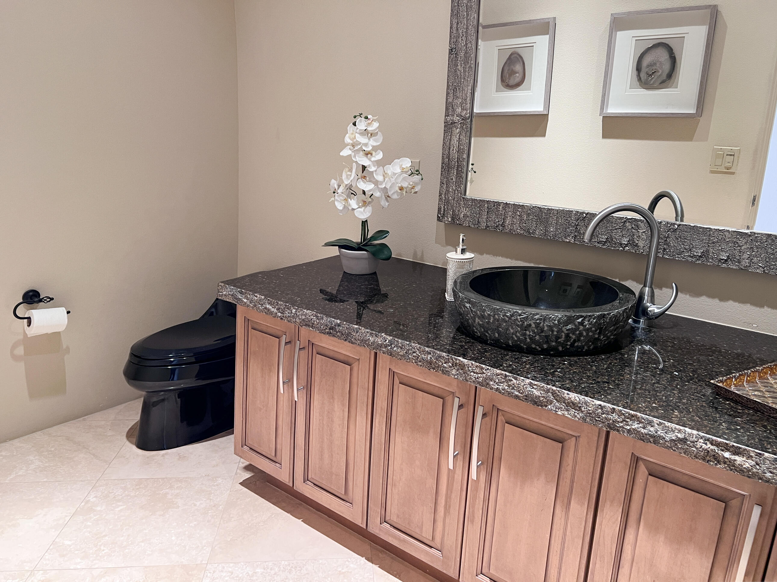 29 Sun Ridge Circle Rancho Mirage, CA 92270 - Photo 45 of 57 a kitchen with granite countertop a sink and a stove
