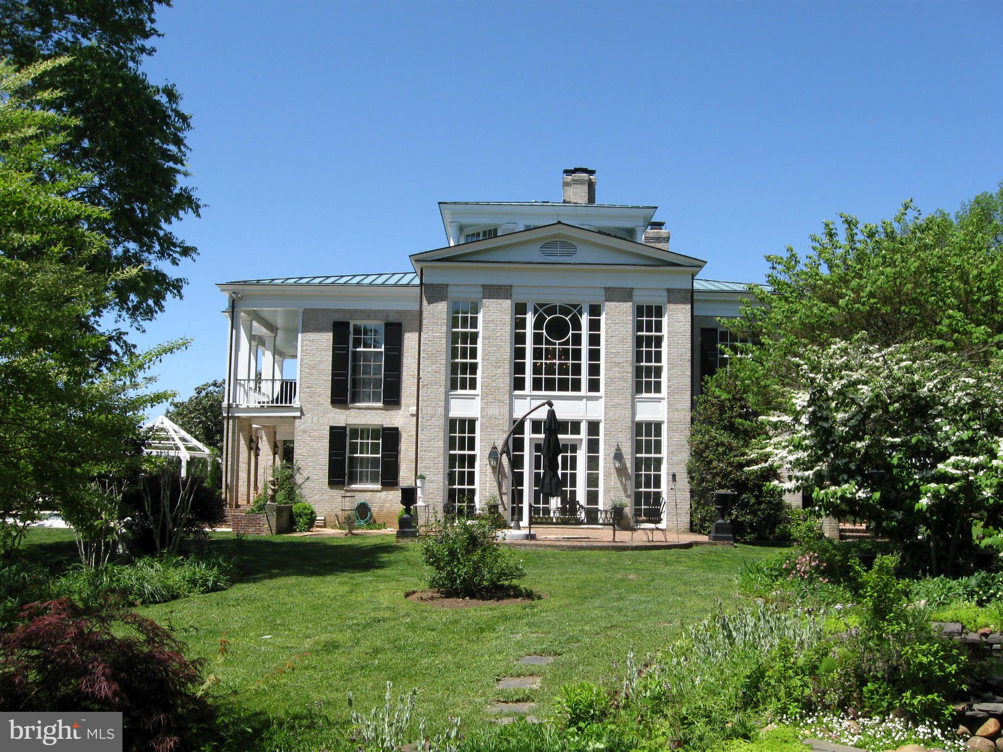 575 Lee Road Crozier, VA 23039 - Photo 13 of 45 Eastern elevation's solarium