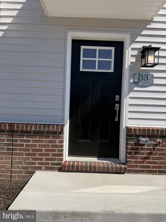 a front view of a house with a door