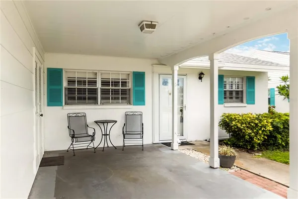 a view of a back yard of the house