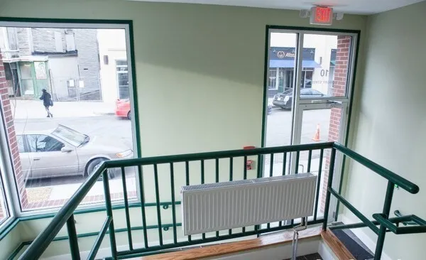 a view of balcony with furniture