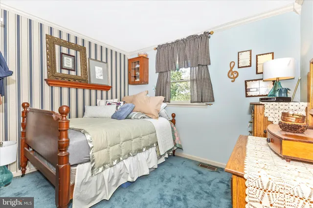 a bathroom with a double vanity sink toilet mirror and bathtub
