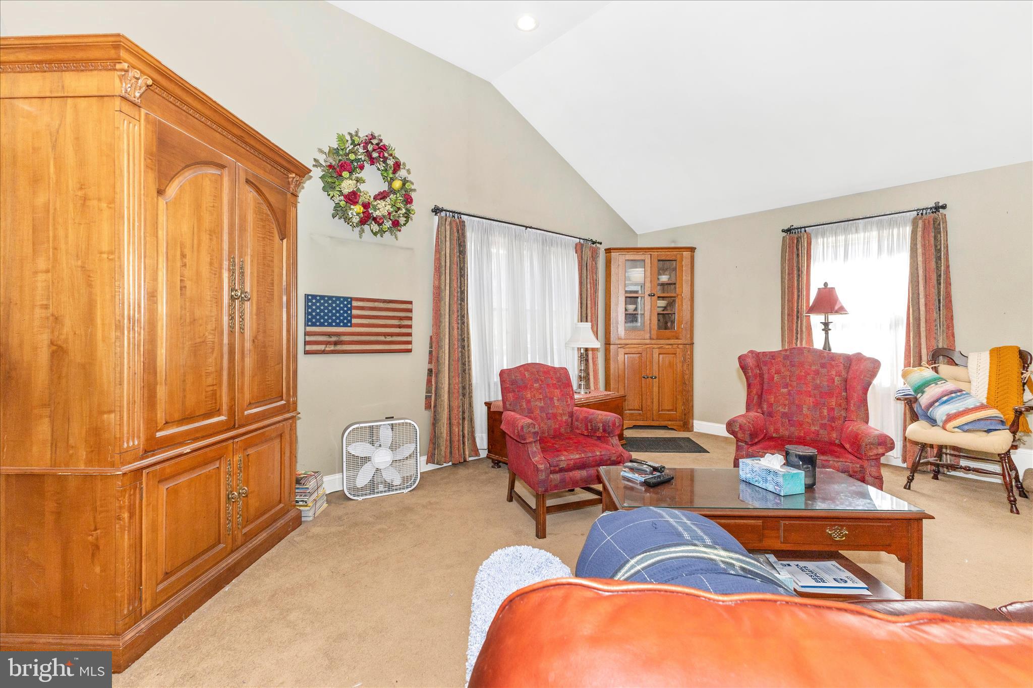 1111 Cummings Avenue Baltimore, MD 21228 - Photo 6 of 48 a living room with furniture and a window