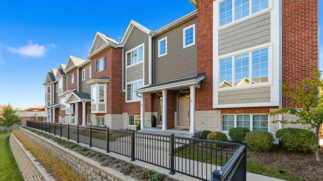 a front view of a house with balcony