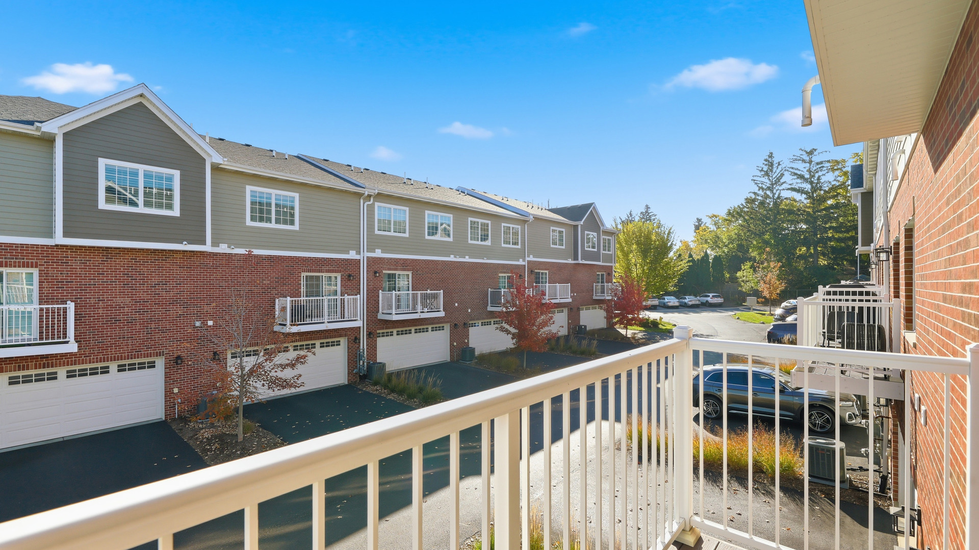 416 North Cass Avenue, Unit 6 Westmont, IL 60559 - Photo 23 of 24 a view of a brick building next to a yard