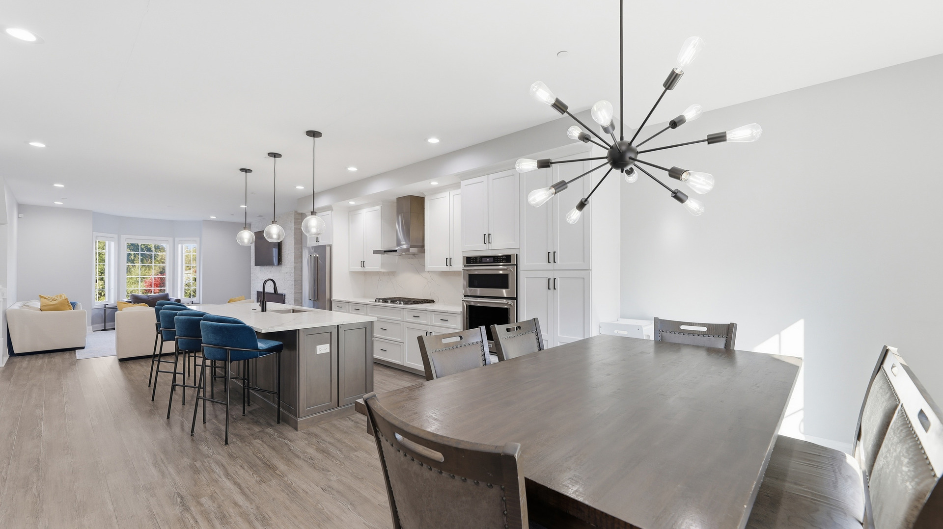 416 North Cass Avenue, Unit 6 Westmont, IL 60559 - Photo 6 of 24 a dining hall with stainless steel appliances kitchen island granite countertop a dining table chairs and a refrigerator