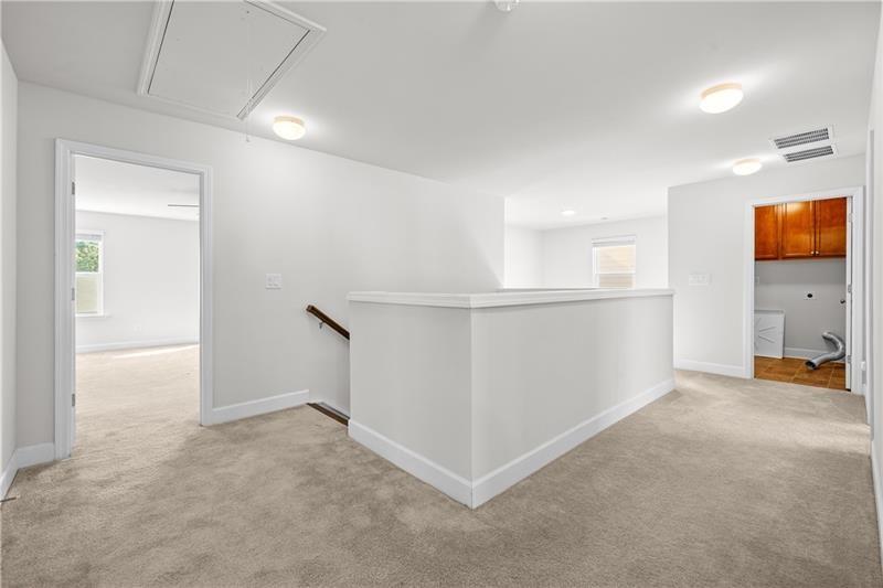 5689 Wheeler Ridge Road Auburn, GA 30011 - Photo 23 of 40 an empty room with windows