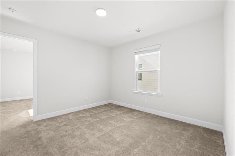 5689 Wheeler Ridge Road Auburn, GA 30011 - Photo 24 of 40 an empty room with a window