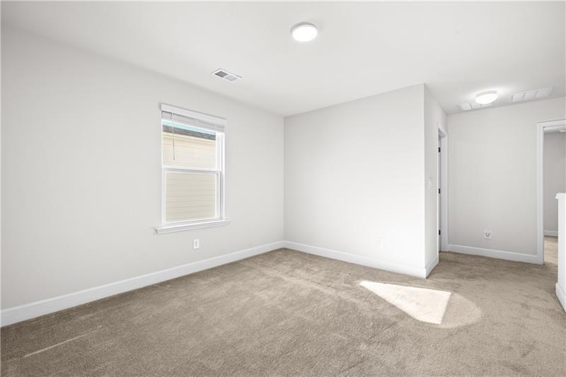 5689 Wheeler Ridge Road Auburn, GA 30011 - Photo 25 of 40 an empty room with a window
