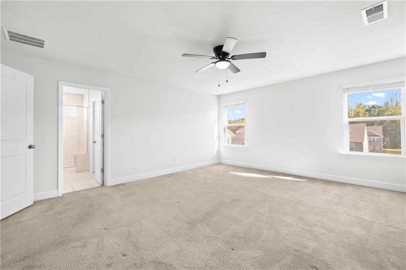 5689 Wheeler Ridge Road Auburn, GA 30011 - Photo 28 of 40 a view of an empty room with a window