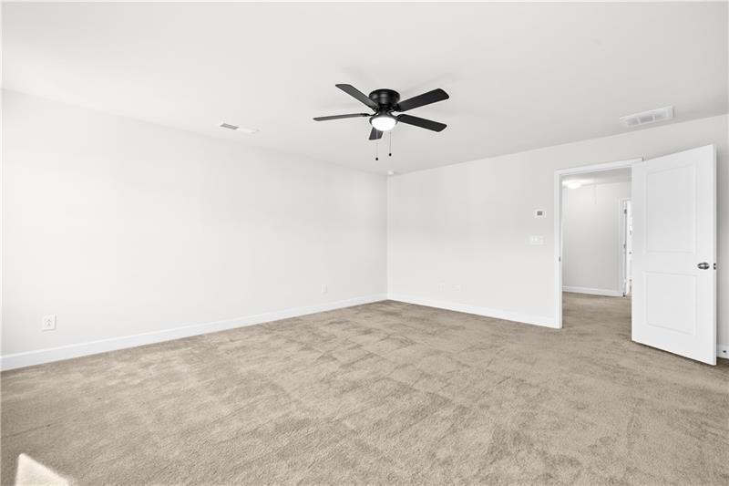 5689 Wheeler Ridge Road Auburn, GA 30011 - Photo 30 of 40 a view of a big room with carpet