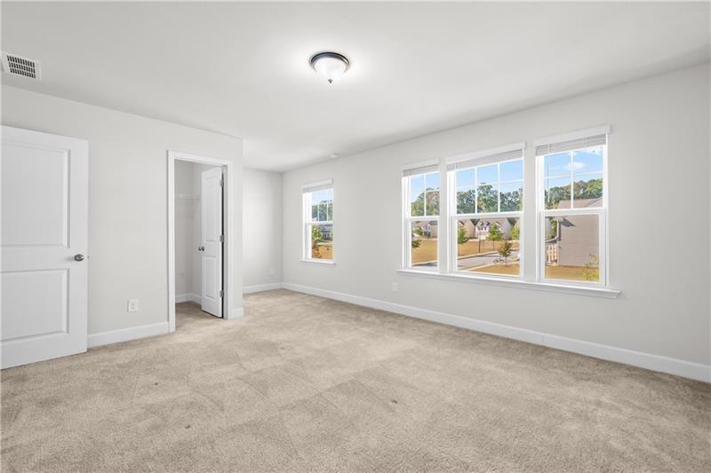 5689 Wheeler Ridge Road Auburn, GA 30011 - Photo 34 of 40 an empty room with windows
