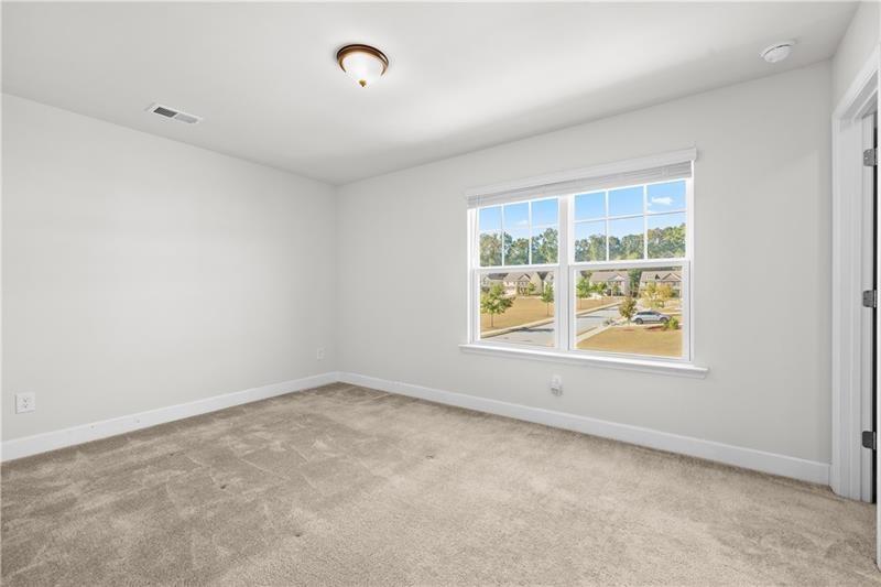 5689 Wheeler Ridge Road Auburn, GA 30011 - Photo 36 of 40 an empty room with a window