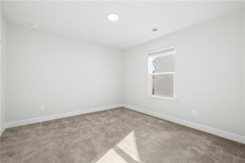 5689 Wheeler Ridge Road Auburn, GA 30011 - Photo 38 of 40 an empty room with a window
