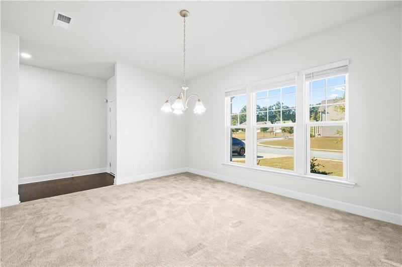 5689 Wheeler Ridge Road Auburn, GA 30011 - Photo 8 of 40 a view of an empty room with a window